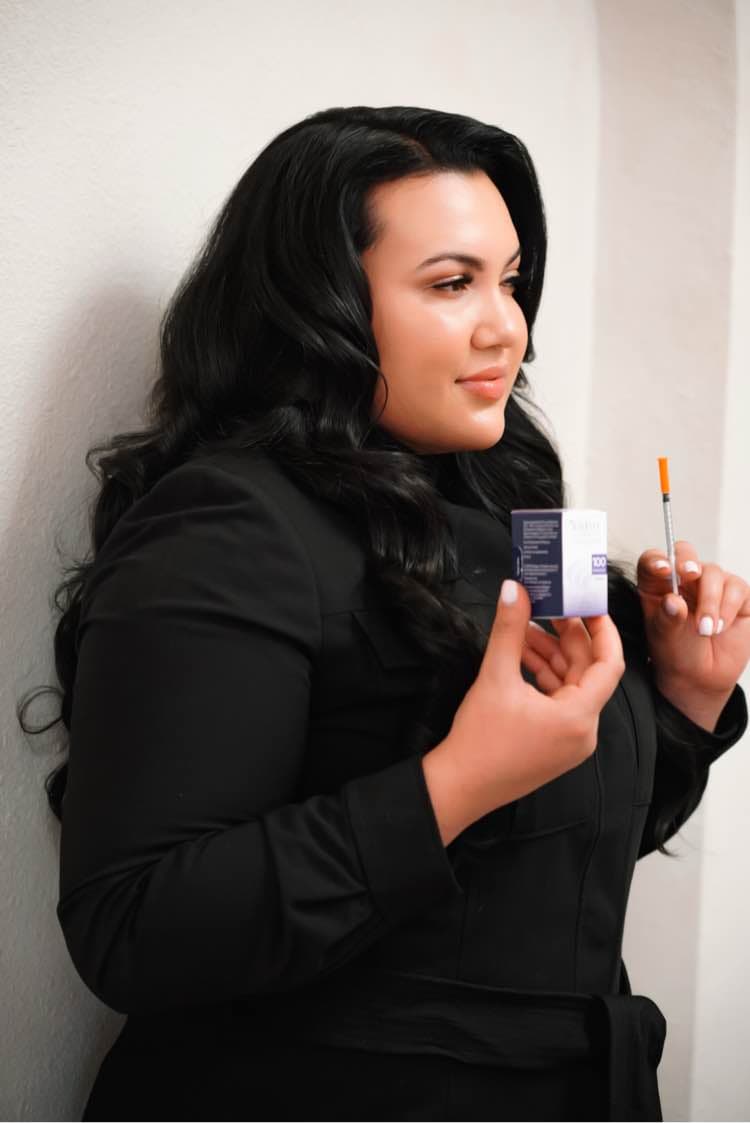 Lulu holding her botox