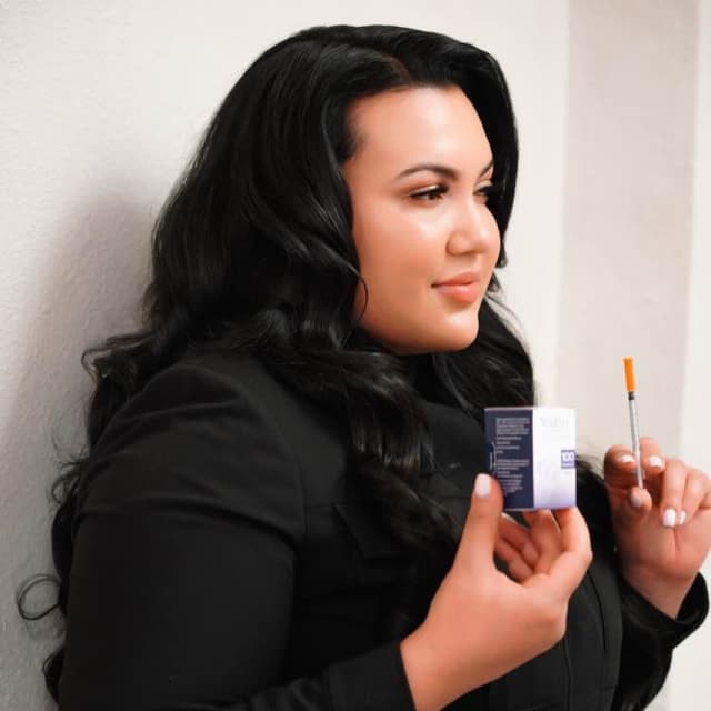 Lulu holding her botox